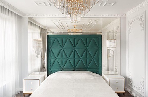 Our Lorenzo cabinets and the Glamor chandelier in an amazing bedroom.