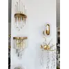 Kinkiet złoty, glamour, nowoczesny, lampa ścienna VALO w jasnym wnętrzu, doskonały do podkreślenia stylu. Oświetlenie na zamówienie od Primavera Home.