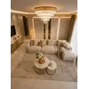 Stolik kawowy okrągły glamour, złoty, biały marmur MARCO GOLD na tle roślinności. Aranżacja nowoczesnego wnętrza harmonizująca z naturą od Primavera Home.