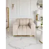 Fotel LONDON Beżowy na ekspozycji w showroomie. Meble na zamówienie od Primavera Home.