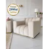 Fotel LONDON Beżowy w ujęciu z przodu. Ekspozycja w salonie od Primavera Home.
