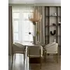 Lampa wisząca złota Florencja w chwili emitującego światła, doskonała do nowoczesnego wnętrza. Oświetlenie na zamówienie od Primavera Home.