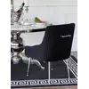Nowoczesne krzesło czarne srebrne tapicerowane z uchwytem, do jadalni, glamour PALOMA w jasnym wnętrzu, które podkreśla jego elegancję. Ekspozycja w salonie Primavera Home.