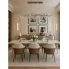Szczegółowy detal stolika designerskiego glamour ze szklanym blatem, stalowego, nowoczesnego, srebrnego ELITE, który charakteryzuje się oryginalnością w wykonaniu od Primavera Home.