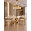 Detal nóg złotego stołu rozkładanego z blatem spiek kwarcowy biały złoty, prezentujący elegancki design od Primavera Home.