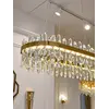 Żyrandol BULGARI L 100cm Złoty w efekcie po zapaleniu. Oświetlenie na zamówienie od Primavera Home.