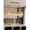 Żyrandol BULGARI L 100cm Złoty w luksusowym wnętrzu. Ekspozycja w salonie od Primavera Home.