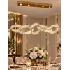 Żyrandol CRYSTAL 5 Złoty w cichym kącie wnętrza. Ekspozycja w salonie od Primavera Home.