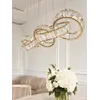 Żyrandol CRYSTAL 5 Złoty w stylistyce modern. Detal wykończenia od Primavera Home.