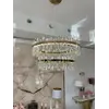 Elegancki detal Żyrandola Kryształowego Bulgari XL Złoty Dwupoziomowy, który ożywia każde pomieszczenie. Oświetlenie na zamówienie od Primavera Home.