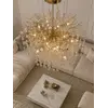 Luksusowy styl żyrandola kryształowego złotego QUEEN, dodający blasku wnętrzom od Primavera Home.