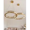 Ekspozycja w salonie z Żyrandolem Kryształowym Ring Złoty Eclipse. Stylizacja od Primavera Home.
