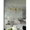 Design żyrandola kryształowego złotego QUEEN jako inspiracja do nowoczesnego wystroju wnętrz od Primavera Home.