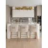 Wysokiej jakości hoker glamour w profilu, idealny do aranżacji nowoczesnego wnętrza. Meble na zamówienie od Primavera Home.