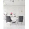 Stół srebrny z białym marmurowym eksponowany w salonie sprzedaży, przyciągający wzrok swoją elegancją, od Primavera Home.