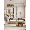 Ekspozycja sofy Beżowej Glamour Aksamitnej FLORENCE Złote Nogi w zestawieniu z innymi meblami od Primavera Home.