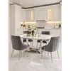 Widok z perspektywy na zestaw stół srebrny z białym marmurowym 180 cm ART DECO + 6 krzeseł szarych srebrnych DIANA, idealnie wpasowany w aranżację nowoczesnego wnętrza od Primavera Home.