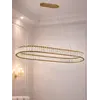 Stylowy dodatek w postaci żyrandola nowoczesnego złotego Crystal, który wzbogaca każdy wystrój od Primavera Home.