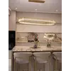 Żyrandol nowoczesny złoty Crystal w nowoczesnym designie wnętrz, wykreowany przez Primavera Home.