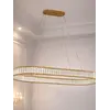 Żyrandol nowoczesny złoty Crystal w ujęciu z przodu. Oświetlenie na zamówienie od Primavera Home.