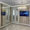 Duży żyrandol designerski złoty RAIN XL widok ogólny w wysokim holu