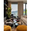 Fotel Lounge z Podnóżkiem w perspektywie. Aranżacja nowoczesnego wnętrza od Primavera Home.