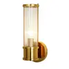 Kinkiet kryształowy, złoty nowoczesny do sypialni, łazienki, lampa ścienna 27 cm RONALD S, wykończenie metalowe, podkreślające elegancję i nowoczesność. Produkt od Primavera Home.