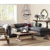 Chesterfield corner sofa with fold-out bedroom function, upholstered in glamour style