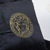 Decorative black velvet pillow with gold logo Medusa