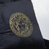 Decorative black velvet pillow with gold logo Medusa