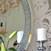 A diamond round mirror in the galmour style PAOLA SILVER