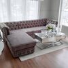 Chesterfield corner sofa with fold-out bedroom function, upholstered in glamour style
