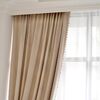 Exclusive curtain richly decorated with haberdashery
