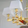 Złoty żyrandol w stylu glamour