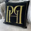 Cushion 40x40 with the PH logo, black, gold, decorative, square