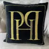 Cushion 40x40 with the PH logo, black, gold, decorative, square