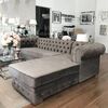 Chesterfield corner sofa with fold-out bedroom function, upholstered in glamour style