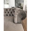 Chesterfield corner sofa with fold-out bedroom function, upholstered in glamour style