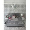 A glamor upholstered quilted bed modern New York style gray SPECTRE