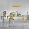 Designer dining table, glamor, with a glass top, steel, gold ELITE OUTLET