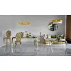 Designer dining table, glamor, with a glass top, steel, gold ELITE OUTLET