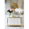 Lorenzo M Gold Glamour wooden lacquered chest of drawers with steel legs