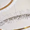 BRINA XL glamor crystal chandelier, gold, designer, exclusive in a modern style, two-story round hanging lamp