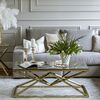 Coffee table glamor with a glass top, steel gold CONRAD OUTLET