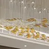 Designer golden glass leaf decoration hanging from the ceiling - LEAF FLOW