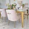 Designer dining table, glamor, with a glass top, steel, gold ELITE