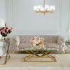 Meble glamour wyprzedaż – sofa tapicerowana ze złotymi akcentami Primavera Home