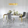 Designer dining table, glamor, with a glass top, steel, gold ELITE