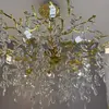 Krystaliczny blask żyrandola kryształowego QUEEN w eleganckim wnętrzu od Primavera Home.