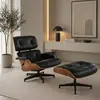 Aranżacja fotela Lounge z podnóżkiem w nowoczesnym salonie. Meble od Primavera Home.